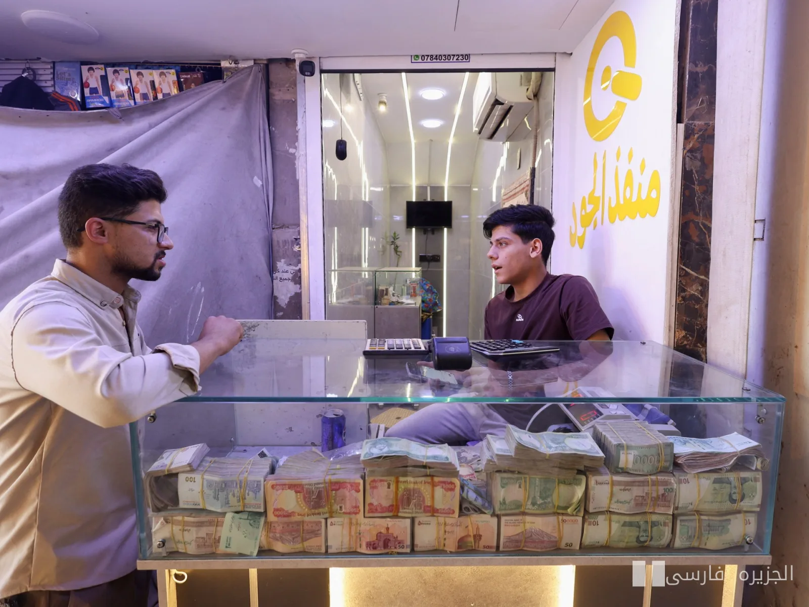 عراق نرخ ارز را کاهش داد و نمایندگان مخالف خواستار بازنگری شدند